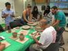 Students learning to replicate archaeological ceramics